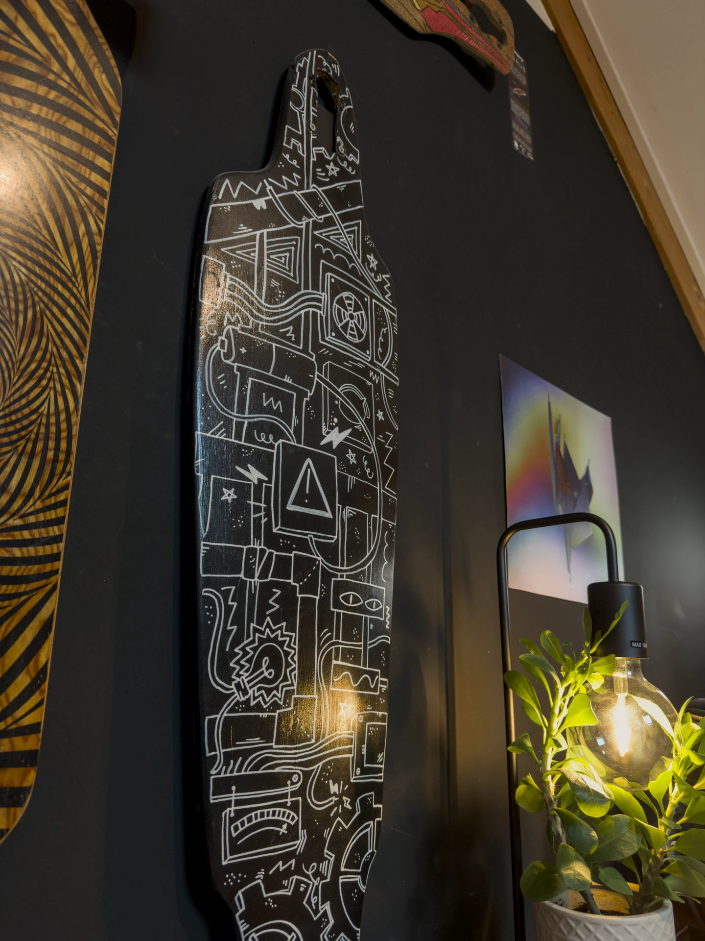 Close-up of the black-and-white illustrated graphic on the underside of the Globe Prowler